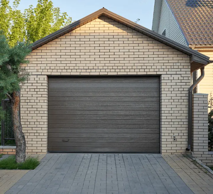 An image of a garage with a brown door An image of a garage with a brown door