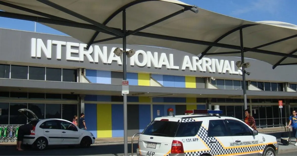 Cars parked outside international arrival terminal of an airport