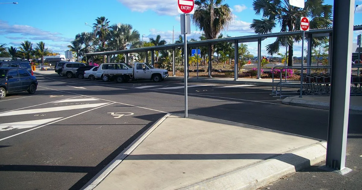 Various vehicles parked in a designated parking space
