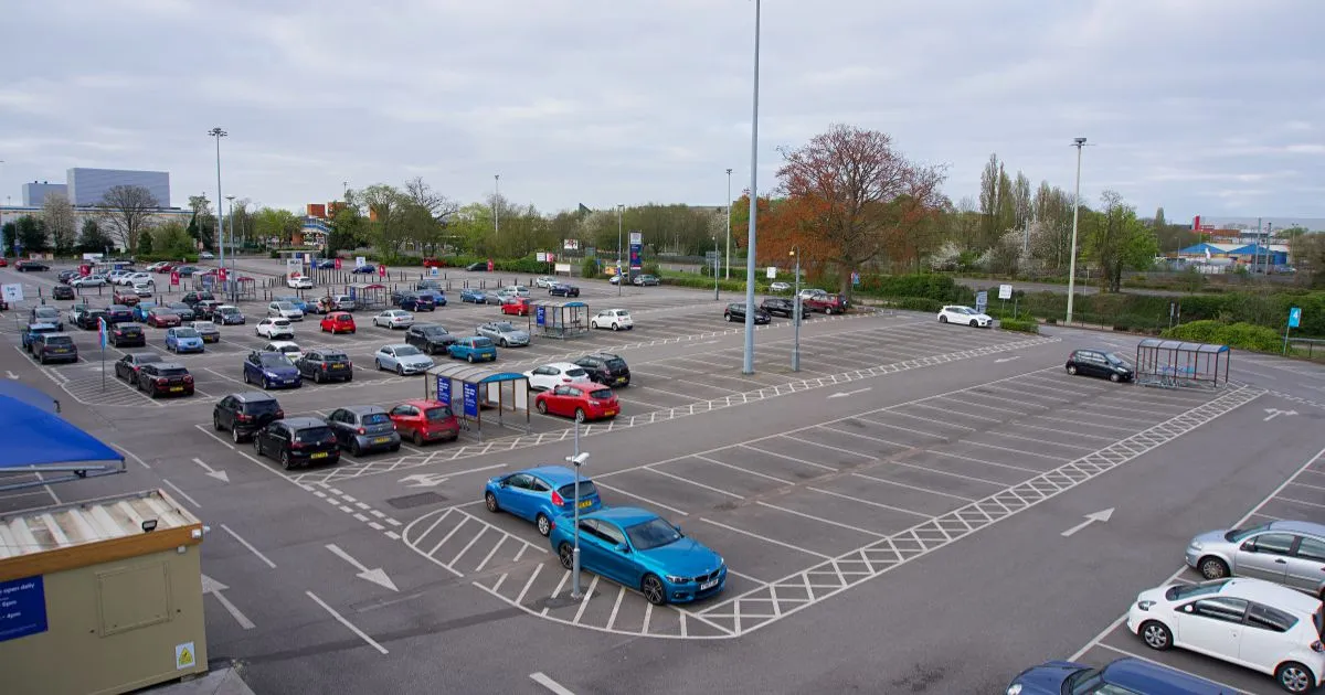 A Convention Centre Parking Lot With Uncovered Parking Spaces A Convention Centre Parking Lot With Uncovered Parking Spaces