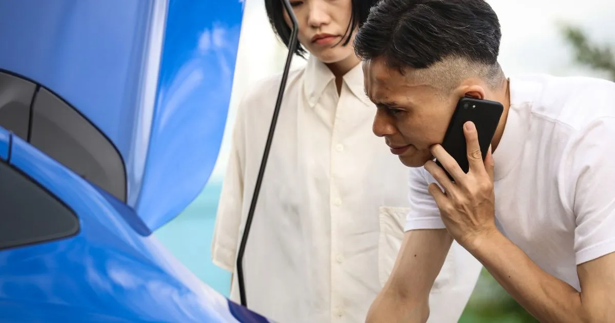 A Driver Tracing Fault In His Car