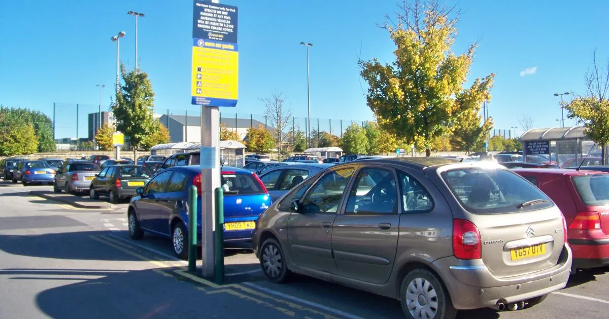 A Huge Parking Lot Of A Shopping Centre With Spaces For Parents With Prams A Huge Parking Lot Of A Shopping Centre With Spaces For Parents With Prams