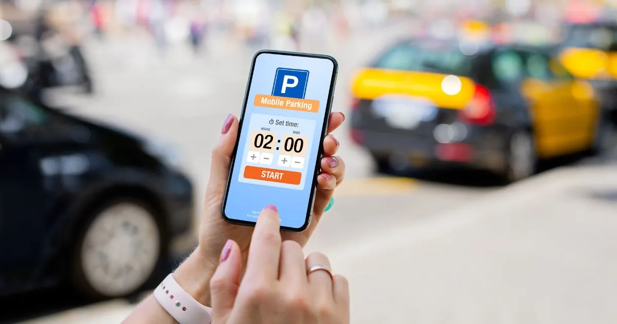 A Lady Setting Parking Time On Her Phone Using A Parking App