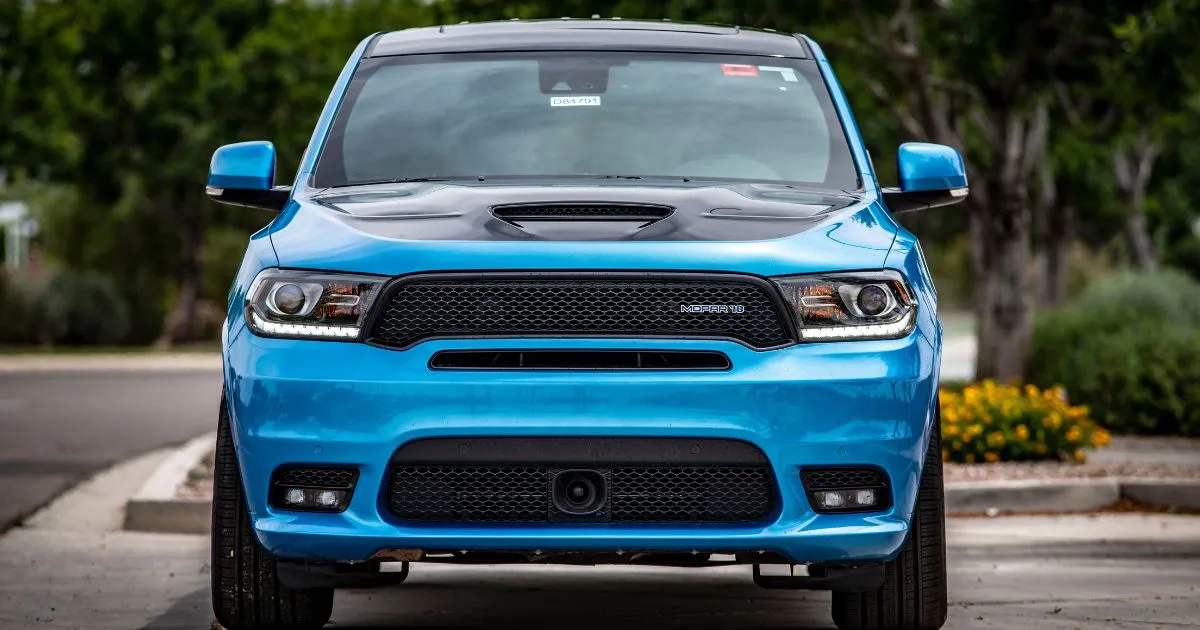 A Luxury Autonomous Vehicle Parked In An Open Parking Lot A Luxury Autonomous Vehicle Parked In An Open Parking Lot