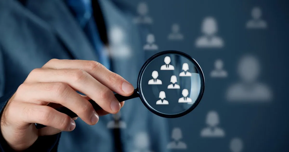 A Man Having Lens In His Hand Showing Target Audience A Man Having Lens In His Hand Showing Target Audience