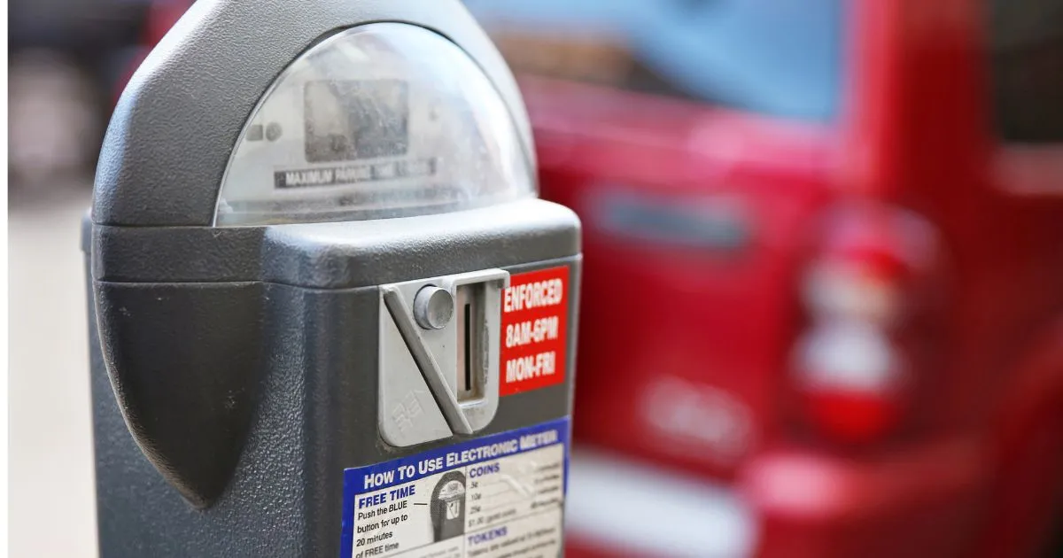 A Parking Meter Installed In A Parking Lot A Parking Meter Installed In A Parking Lot