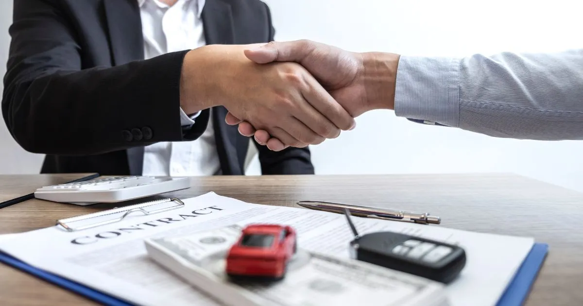 A Renter And A Landlord Shaking Hands After Making A Parking Rental Contract A Renter And A Landlord Shaking Hands After Making A Parking Rental Contract