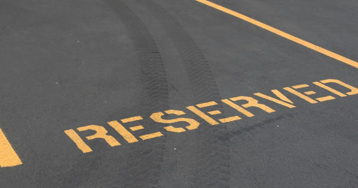 A Reserved Parking Spot In A Parking Lot A Reserved Parking Spot In A Parking Lot