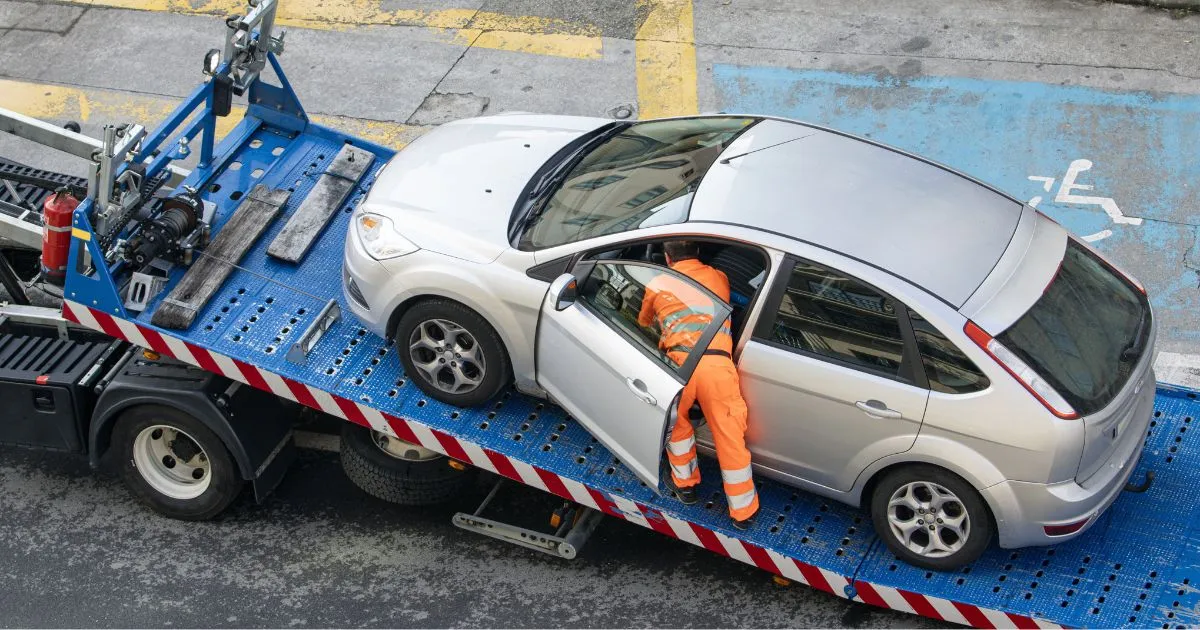 A Vehicle Has Been Towed By The Authorities From An Illegal Parking Space A Vehicle Has Been Towed By The Authorities From An Illegal Parking Space