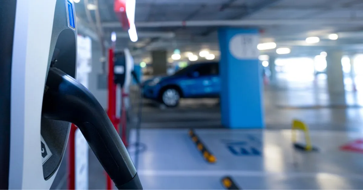 An Electric Vehicle Charging Station Installed In A Car Park An Electric Vehicle Charging Station Installed In A Car Park