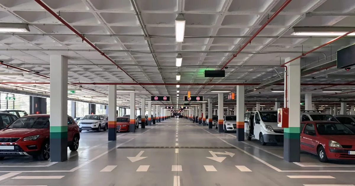 Cars Parked In Tandem In A Parking Lot
