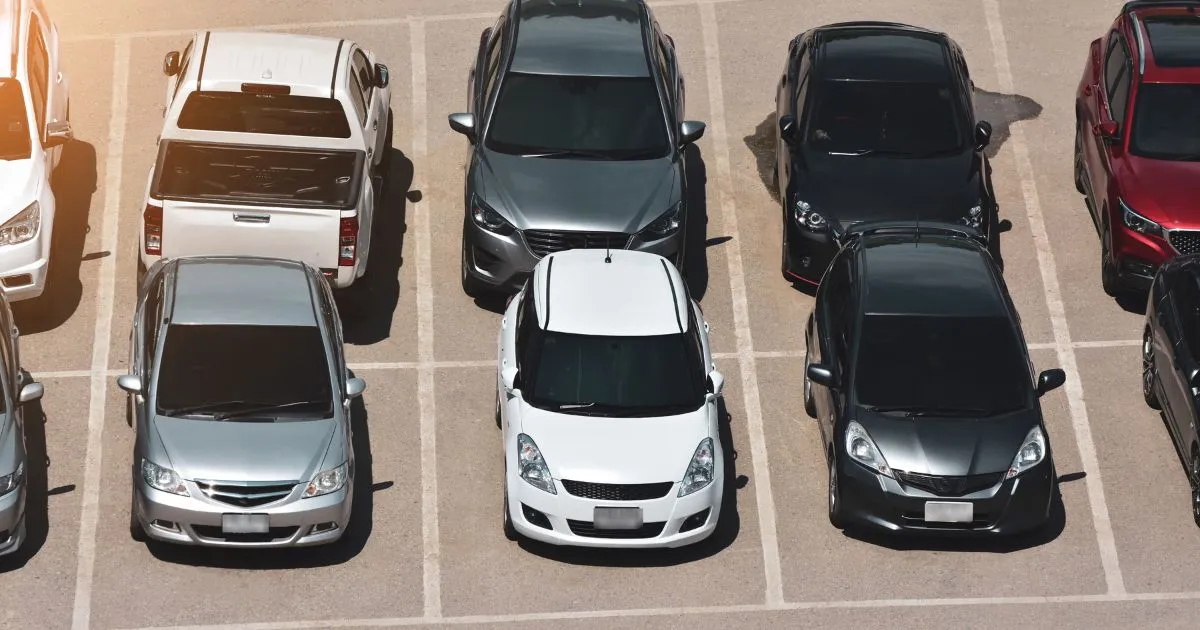 Multiple Vehicles Parked In An Outdoor Airport Car Park Multiple Vehicles Parked In An Outdoor Airport Car Park