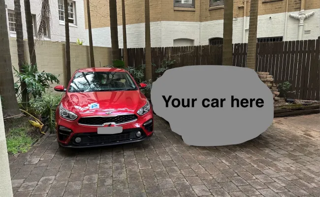 Parking For Rent - Secure Street Level 24/7 Car Space Near Kings Cross Coke Sign