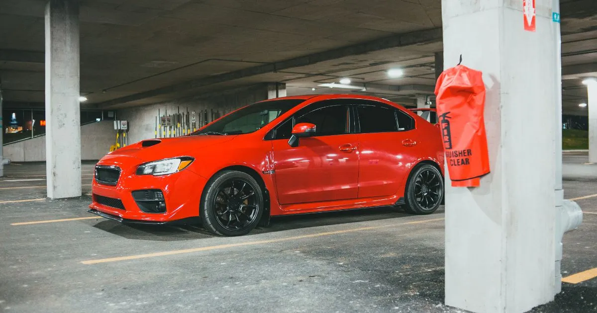 Red Sports Car In Covered Parking Lot