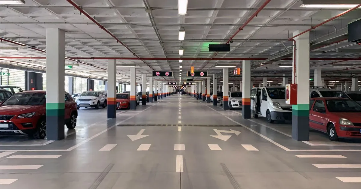 Spacious Underground Parking Lot With Directional Signage Spacious Underground Parking Lot With Directional Signage