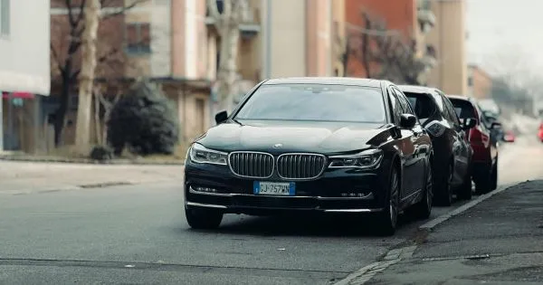 Three On Street Parked Cars In A Residential Area Three On Street Parked Cars In A Residential Area